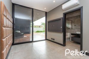 Casa em Condomínio à venda com 327m², 3 dormitórios, 3 suítes, 4 vagas, no bairro Terra Ville em PORTO ALEGRE
