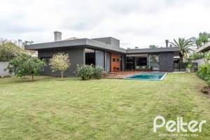 Casa em Condomínio à venda com 327m², 3 dormitórios, 3 suítes, 4 vagas, no bairro Terra Ville em PORTO ALEGRE