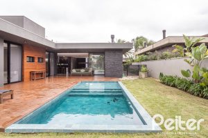 Casa em Condomínio à venda com 327m², 3 dormitórios, 3 suítes, 4 vagas, no bairro Terra Ville em PORTO ALEGRE