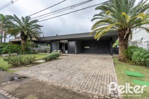 Casa em Condomínio à venda com 327m², 3 dormitórios, 3 suítes, 4 vagas, no bairro Terra Ville em PORTO ALEGRE