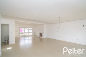 Casa à venda com 265m², 3 dormitórios, 3 suítes, 4 vagas, no bairro Vila Assunção em Porto Alegre