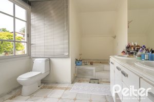 Casa em Condomínio à venda com 322m², 3 dormitórios, 1 suíte, 4 vagas, no bairro Jardim Isabel em Porto Alegre