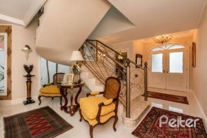 Casa em Condomínio à venda com 338m², 3 dormitórios, 3 suítes, 2 vagas, no bairro Terra Ville em PORTO ALEGRE