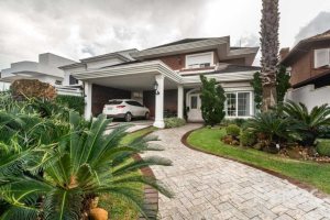 Casa em Condomínio à venda com 338m², 3 dormitórios, 3 suítes, 2 vagas, no bairro Terra Ville em PORTO ALEGRE