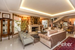 Casa em Condomínio à venda com 338m², 3 dormitórios, 3 suítes, 2 vagas, no bairro Terra Ville em PORTO ALEGRE