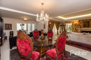 Casa em Condomínio à venda com 338m², 3 dormitórios, 3 suítes, 2 vagas, no bairro Terra Ville em PORTO ALEGRE