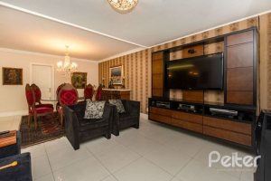 Casa em Condomínio à venda com 338m², 3 dormitórios, 3 suítes, 2 vagas, no bairro Terra Ville em PORTO ALEGRE