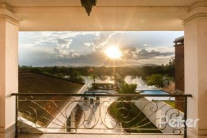 Casa em Condomínio à venda com 338m², 3 dormitórios, 3 suítes, 2 vagas, no bairro Terra Ville em PORTO ALEGRE