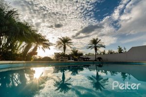 Casa em Condomínio à venda com 338m², 3 dormitórios, 3 suítes, 2 vagas, no bairro Terra Ville em PORTO ALEGRE