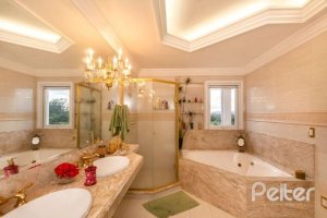 Casa em Condomínio à venda com 338m², 3 dormitórios, 3 suítes, 2 vagas, no bairro Terra Ville em PORTO ALEGRE