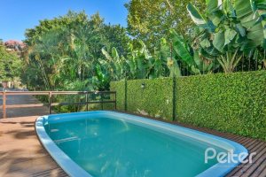 Casa em Condomínio à venda com 317m², 4 dormitórios, 4 suítes, 4 vagas, no bairro Tristeza em Porto Alegre