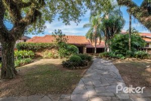 Casa em Condomínio à venda com 320m², 4 dormitórios, 4 suítes, 10 vagas, no bairro Cavalhada em PORTO ALEGRE