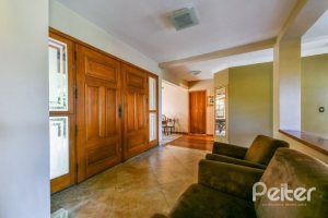 Casa em Condomínio à venda com 320m², 4 dormitórios, 4 suítes, 10 vagas, no bairro Cavalhada em PORTO ALEGRE