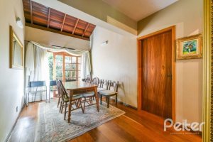 Casa em Condomínio à venda com 320m², 4 dormitórios, 4 suítes, 10 vagas, no bairro Cavalhada em PORTO ALEGRE