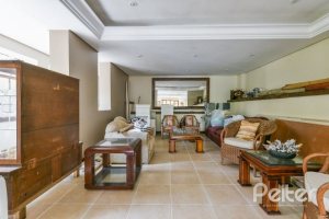 Casa em Condomínio à venda com 320m², 4 dormitórios, 4 suítes, 10 vagas, no bairro Cavalhada em PORTO ALEGRE