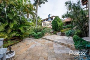 Casa em Condomínio à venda com 320m², 4 dormitórios, 4 suítes, 10 vagas, no bairro Cavalhada em PORTO ALEGRE