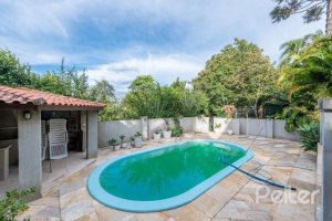 Casa em Condomínio à venda com 320m², 4 dormitórios, 4 suítes, 10 vagas, no bairro Cavalhada em PORTO ALEGRE