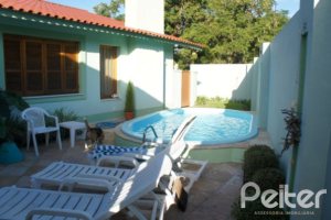 Casa à venda com 240m², 4 dormitórios, 2 suítes, 4 vagas, no bairro Jardim Isabel em Porto Alegre