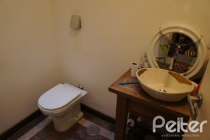 Casa à venda com 240m², 4 dormitórios, 2 suítes, 4 vagas, no bairro Jardim Isabel em Porto Alegre