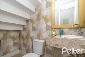 Casa em Condomínio à venda com 240m², 4 dormitórios, 2 suítes, 2 vagas, no bairro Tristeza em Porto Alegre