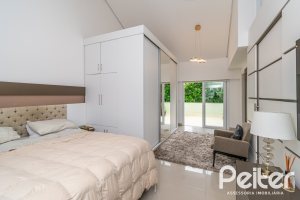 Casa em Condomínio à venda com 240m², 4 dormitórios, 2 suítes, 2 vagas, no bairro Tristeza em Porto Alegre