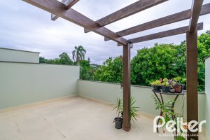 Casa em Condomínio à venda com 240m², 4 dormitórios, 2 suítes, 2 vagas, no bairro Tristeza em Porto Alegre