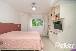 Casa em Condomínio à venda com 240m², 4 dormitórios, 2 suítes, 2 vagas, no bairro Tristeza em Porto Alegre