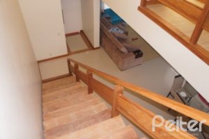 Casa em Condomínio à venda com 263m², 3 dormitórios, 1 suíte, 3 vagas, no bairro Mountain Ville em PORTO ALEGRE