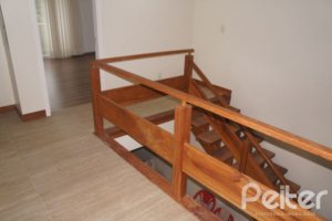 Casa em Condomínio à venda com 263m², 3 dormitórios, 1 suíte, 3 vagas, no bairro Mountain Ville em PORTO ALEGRE