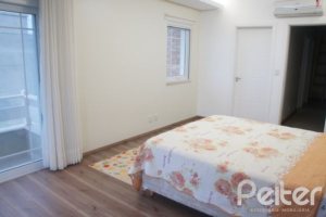 Casa em Condomínio à venda com 263m², 3 dormitórios, 1 suíte, 3 vagas, no bairro Mountain Ville em PORTO ALEGRE