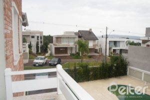 Casa em Condomínio à venda com 263m², 3 dormitórios, 1 suíte, 3 vagas, no bairro Mountain Ville em PORTO ALEGRE