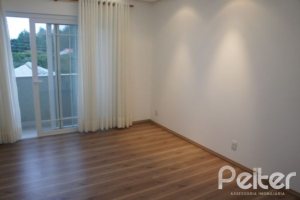 Casa em Condomínio à venda com 263m², 3 dormitórios, 1 suíte, 3 vagas, no bairro Mountain Ville em PORTO ALEGRE