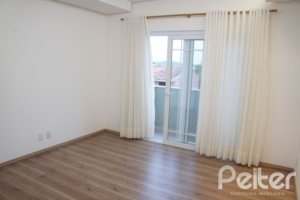 Casa em Condomínio à venda com 263m², 3 dormitórios, 1 suíte, 3 vagas, no bairro Mountain Ville em PORTO ALEGRE