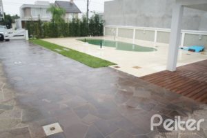 Casa em Condomínio à venda com 263m², 3 dormitórios, 1 suíte, 3 vagas, no bairro Mountain Ville em PORTO ALEGRE