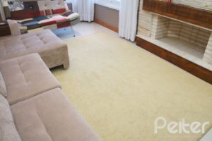 Casa em Condomínio à venda com 263m², 3 dormitórios, 1 suíte, 3 vagas, no bairro Mountain Ville em PORTO ALEGRE