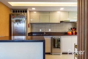 Casa em Condomínio à venda com 210m², 3 dormitórios, 2 suítes, 4 vagas, no bairro Jardim Isabel em Porto Alegre