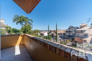 Casa em Condomínio à venda com 210m², 3 dormitórios, 2 suítes, 4 vagas, no bairro Jardim Isabel em Porto Alegre