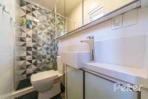 Casa em Condomínio à venda com 210m², 3 dormitórios, 2 suítes, 4 vagas, no bairro Jardim Isabel em Porto Alegre