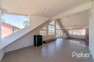 Casa em Condomínio à venda com 210m², 3 dormitórios, 2 suítes, 4 vagas, no bairro Jardim Isabel em Porto Alegre