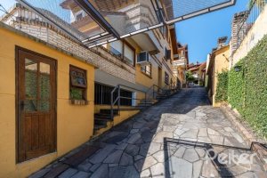 Casa em Condomínio à venda com 210m², 3 dormitórios, 2 suítes, 4 vagas, no bairro Jardim Isabel em Porto Alegre