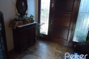 Casa à venda com 495m², 5 dormitórios, 1 suíte, 3 vagas, no bairro Vila Conceição em Porto Alegre