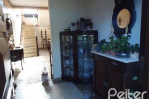 Casa à venda com 495m², 5 dormitórios, 1 suíte, 3 vagas, no bairro Vila Conceição em Porto Alegre