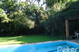 Casa à venda com 495m², 5 dormitórios, 1 suíte, 3 vagas, no bairro Vila Conceição em Porto Alegre