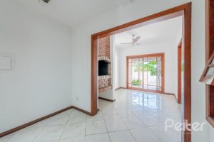 Casa à venda com 350m², 3 dormitórios, 1 suíte, 3 vagas, no bairro Vila Assunção em Porto Alegre
