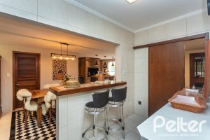 Casa em Condomínio à venda com 220m², 3 dormitórios, 1 suíte, 2 vagas, no bairro Ipanema em Porto Alegre