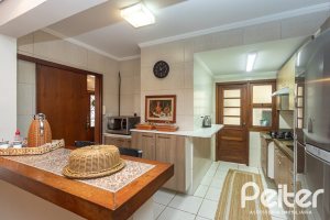 Casa em Condomínio à venda com 220m², 3 dormitórios, 1 suíte, 2 vagas, no bairro Ipanema em Porto Alegre