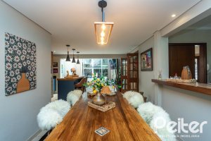 Casa em Condomínio à venda com 220m², 3 dormitórios, 1 suíte, 2 vagas, no bairro Ipanema em Porto Alegre