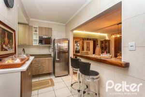 Casa em Condomínio à venda com 220m², 3 dormitórios, 1 suíte, 2 vagas, no bairro Ipanema em Porto Alegre