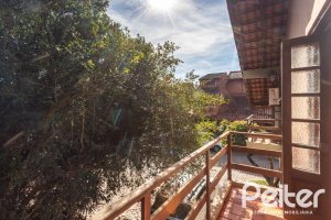 Casa em Condomínio à venda com 220m², 3 dormitórios, 1 suíte, 2 vagas, no bairro Ipanema em Porto Alegre