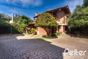 Casa em Condomínio à venda com 220m², 3 dormitórios, 1 suíte, 2 vagas, no bairro Ipanema em Porto Alegre